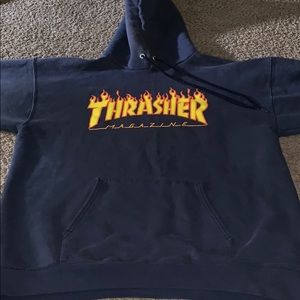 A navy blue sweater in a size medium